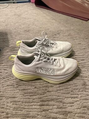 Hoka White Running Shoes with Pale Yellow Accents
